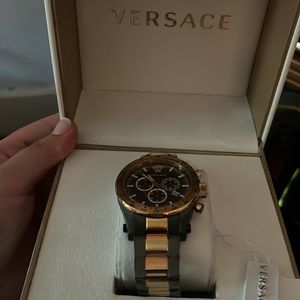 Versace watch new with tags never worn still has plastic around band